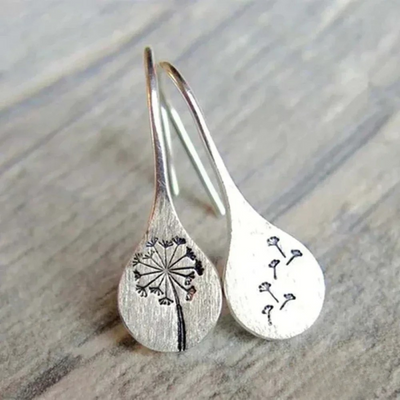 Finely crafted silver dandelion leaf earrings