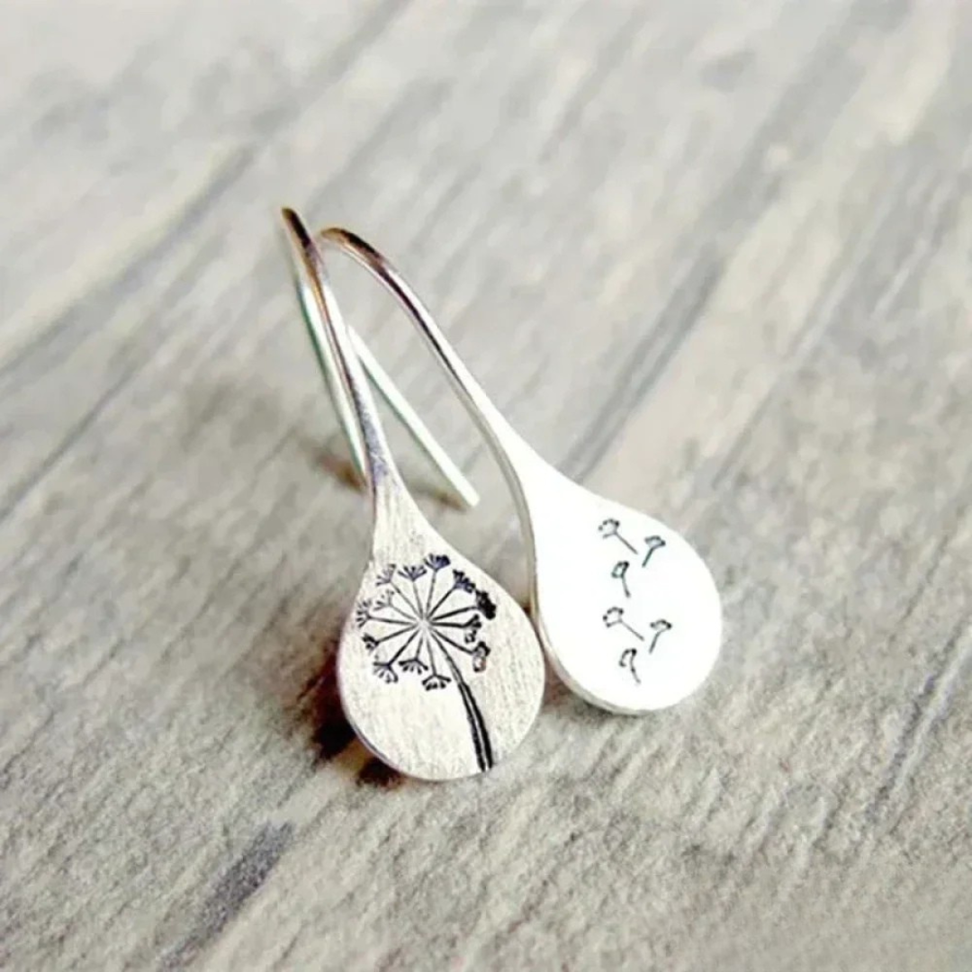 Finely crafted silver dandelion leaf earrings