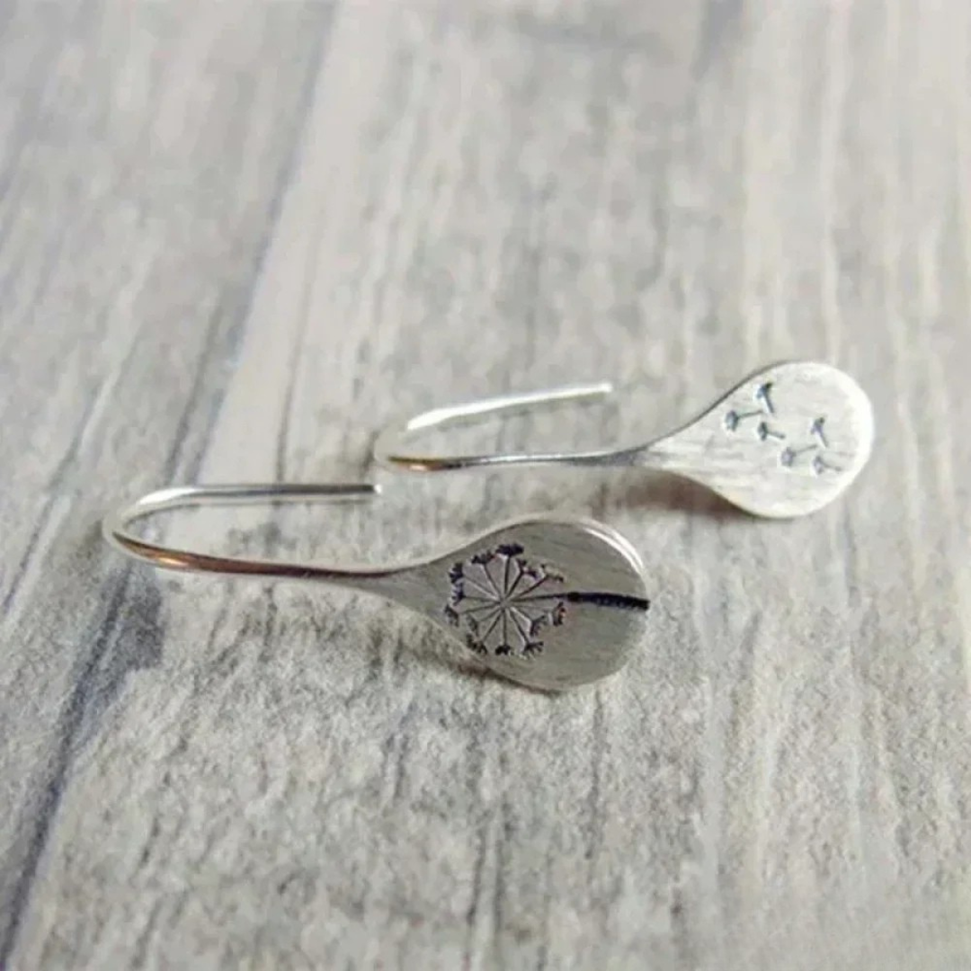 Finely crafted silver dandelion leaf earrings